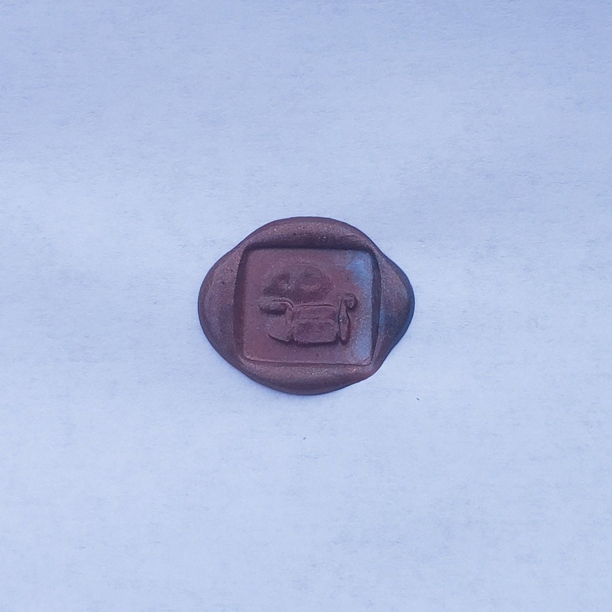 Lounge chair wax seal signet ring