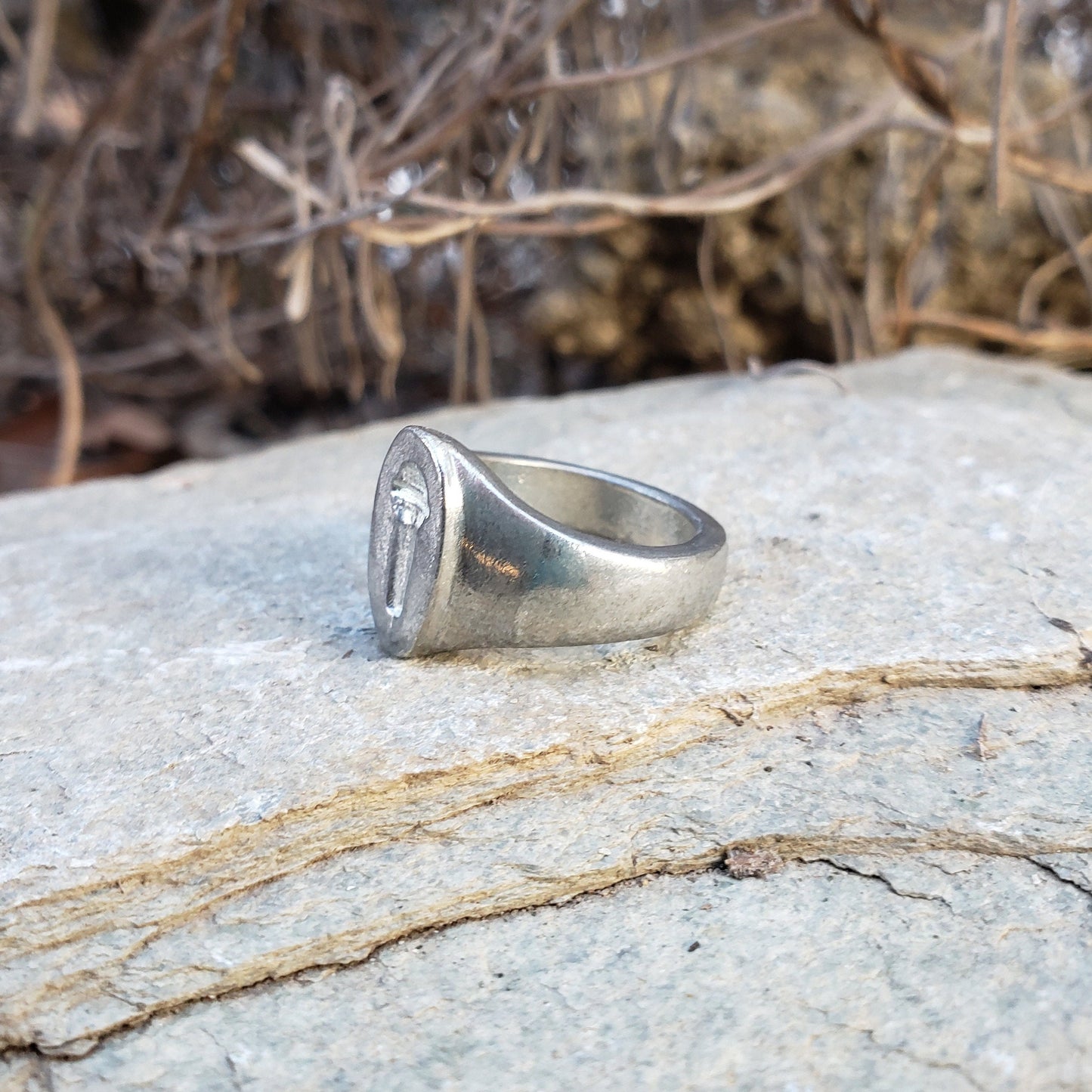 Microphone wax seal signet ring