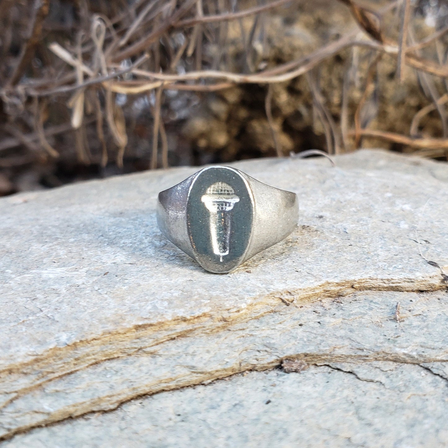 Microphone wax seal signet ring