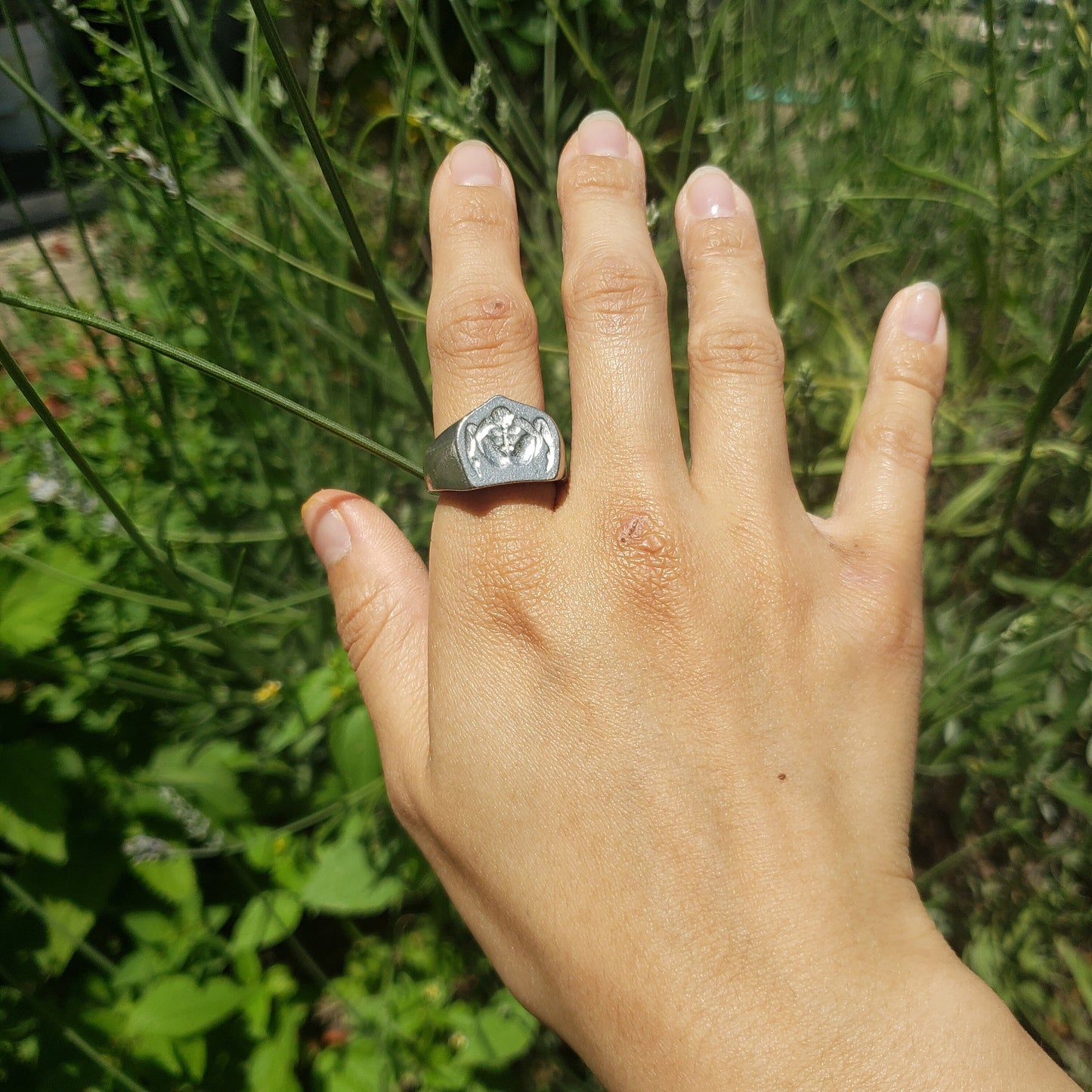 Autofellatio wax seal signet ring