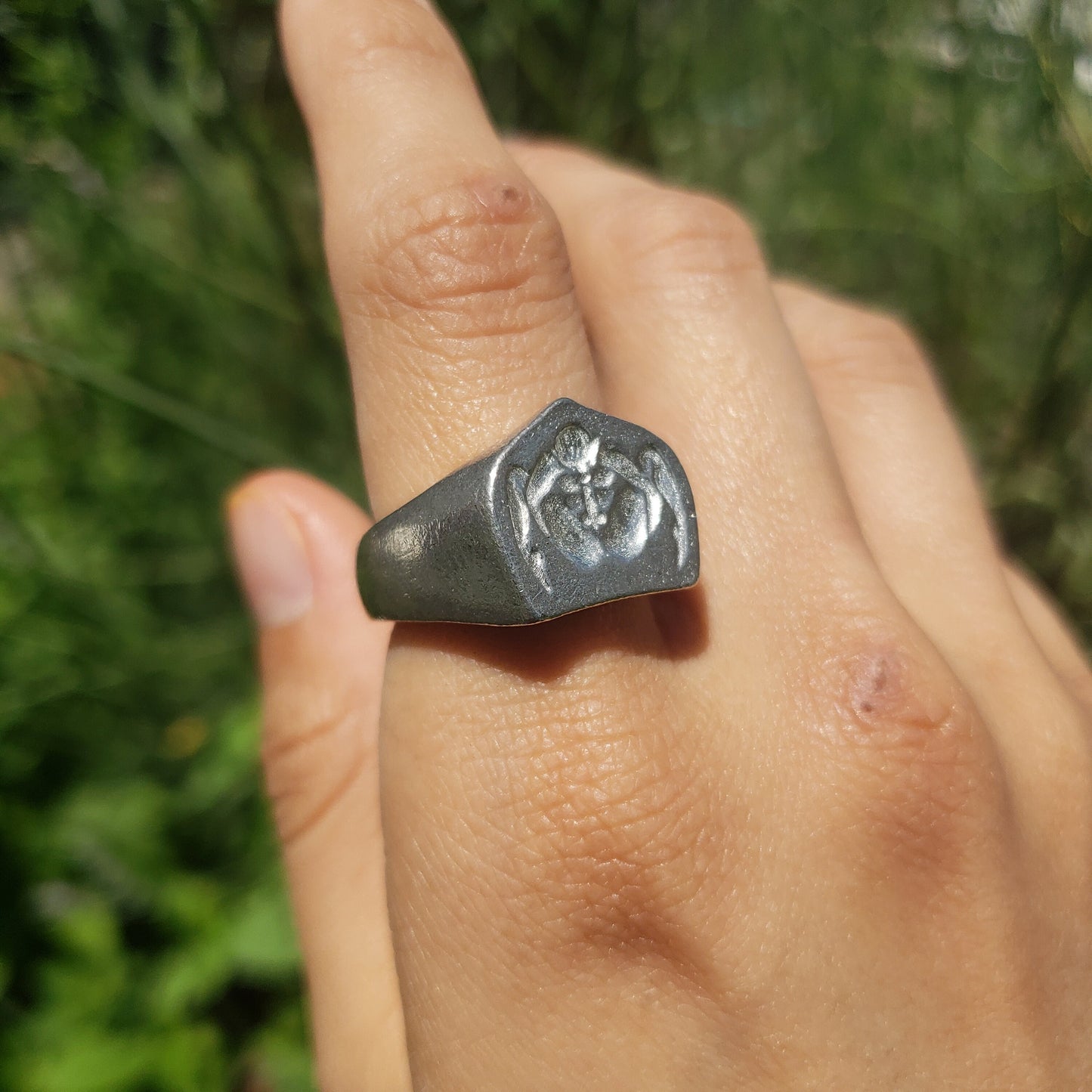 Autofellatio wax seal signet ring