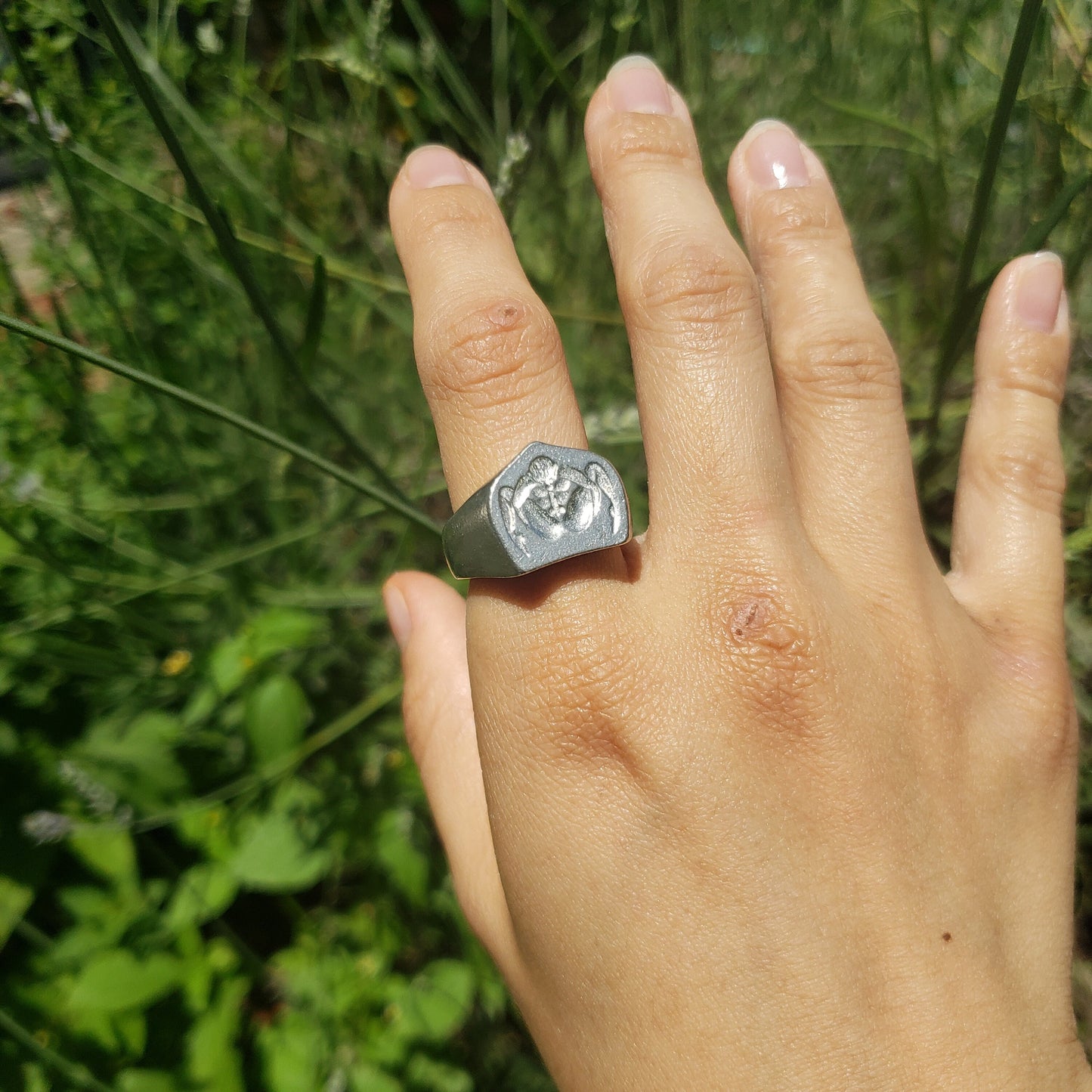 Autofellatio wax seal signet ring