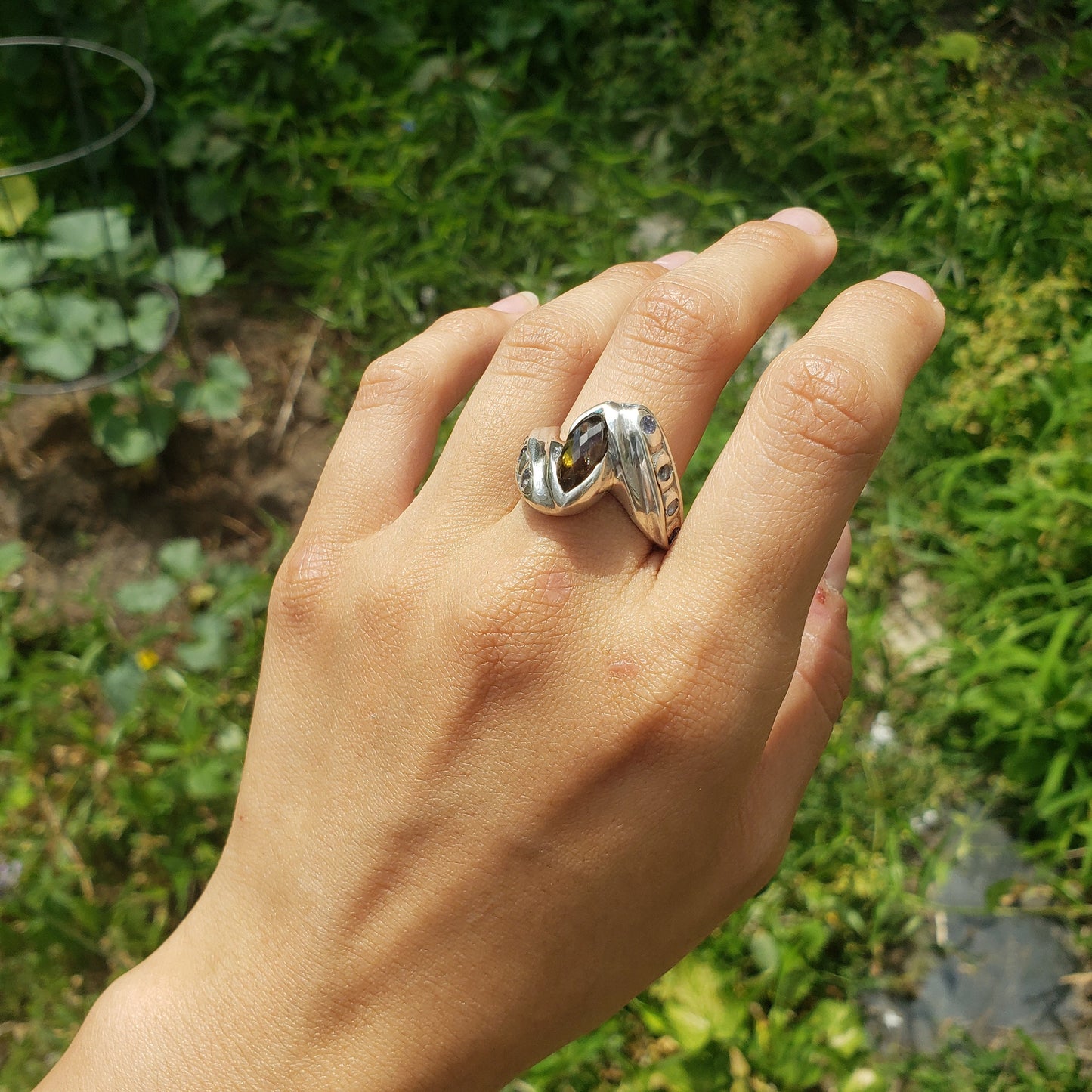 Andalusite marquise and tanzanite ring