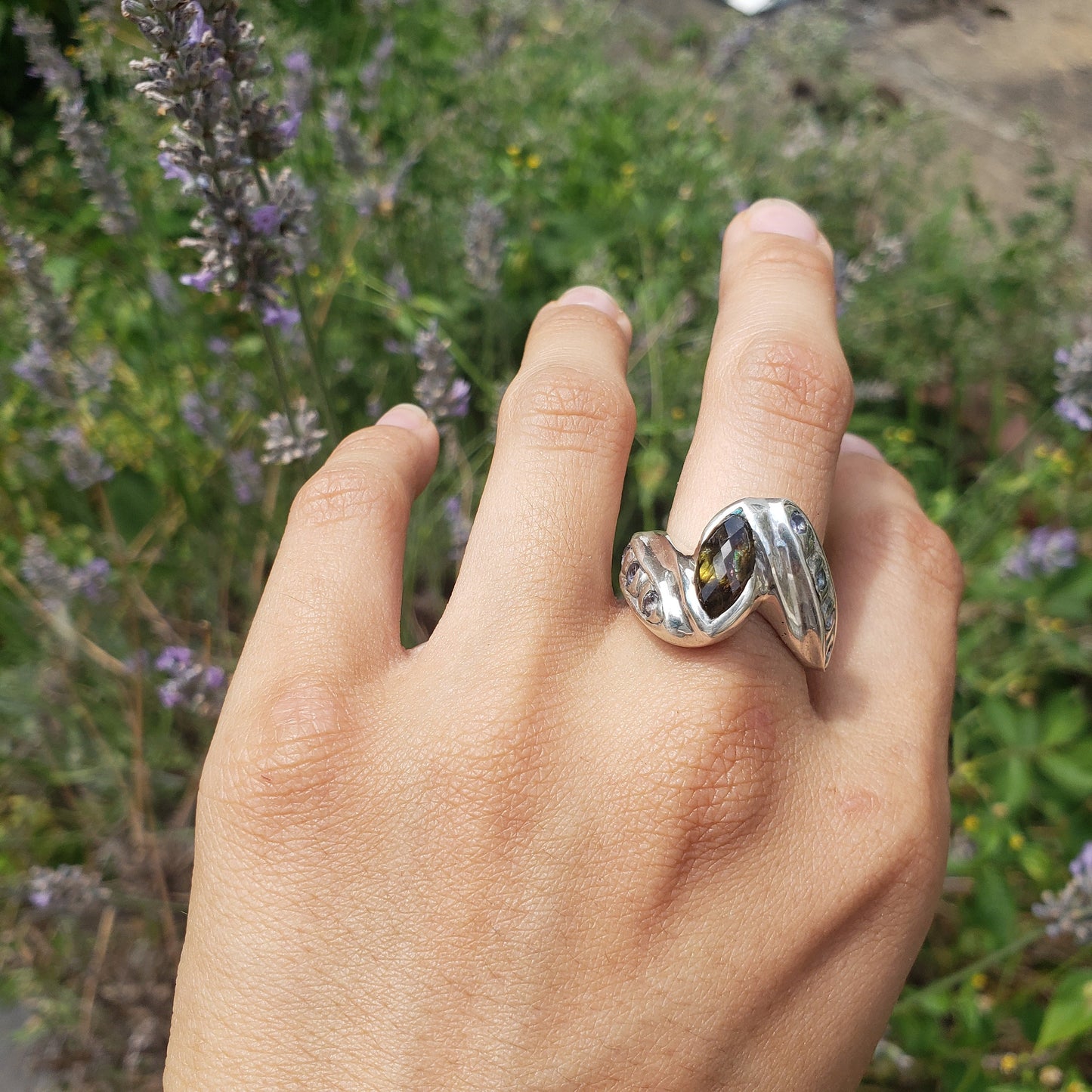 Andalusite marquise and tanzanite ring