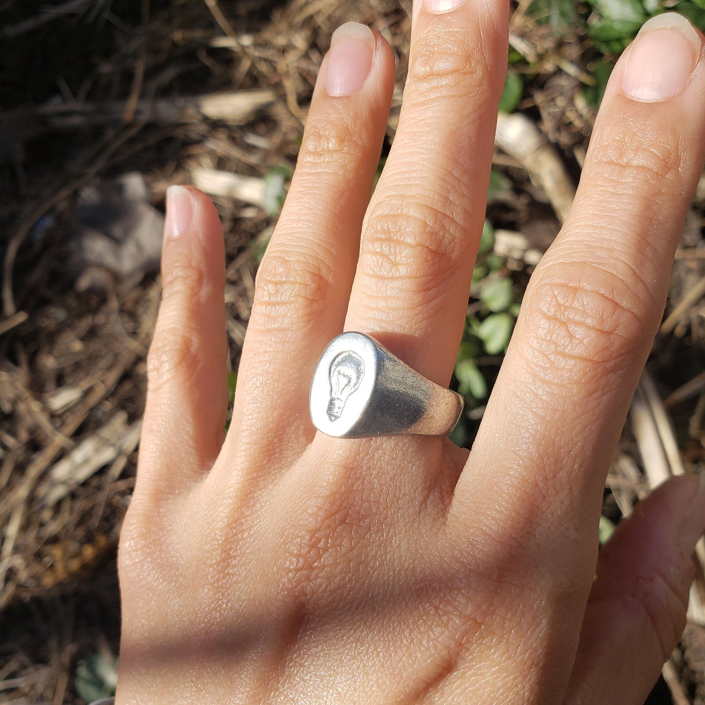 Incandescent lightbulb wax seal signet ring