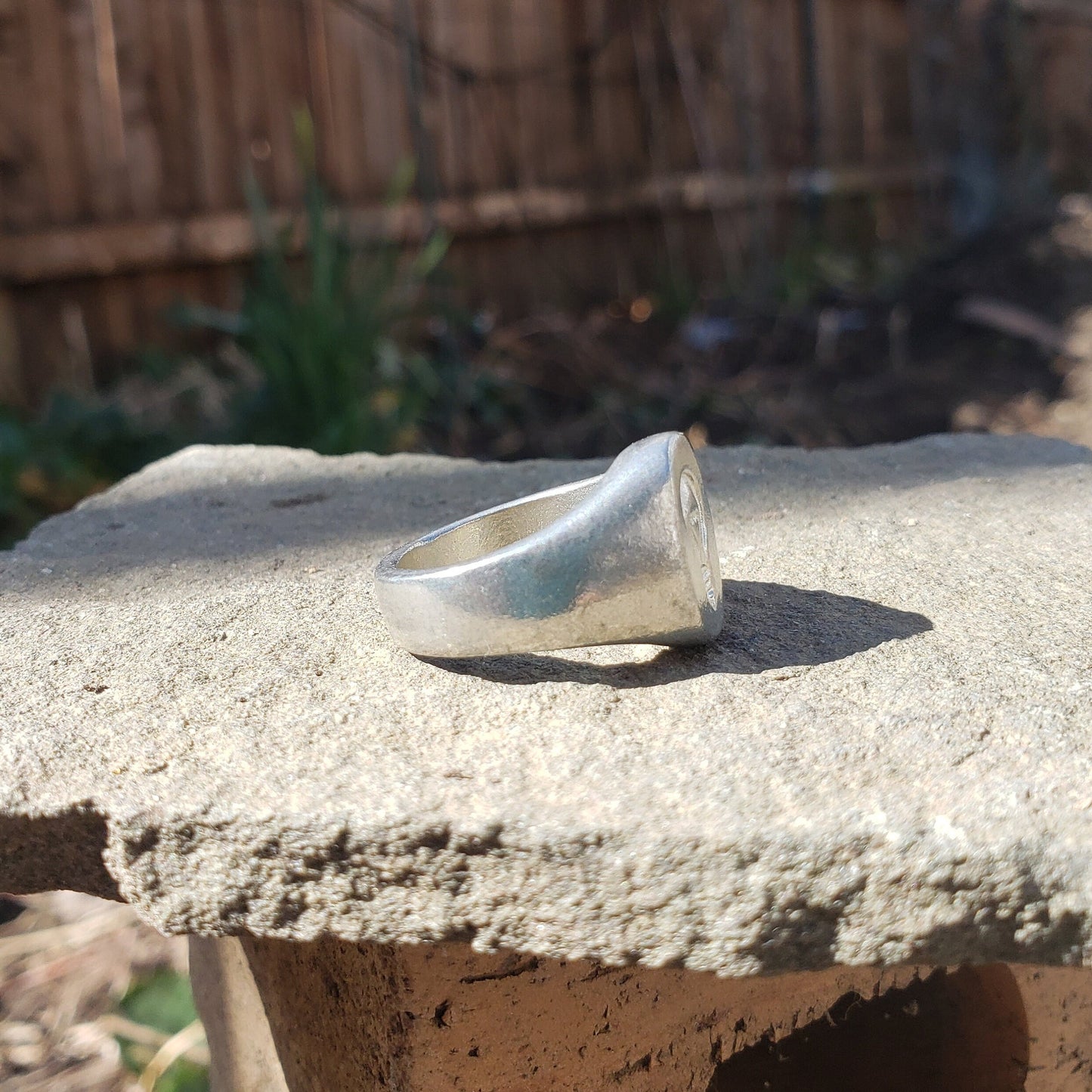 Incandescent lightbulb wax seal signet ring