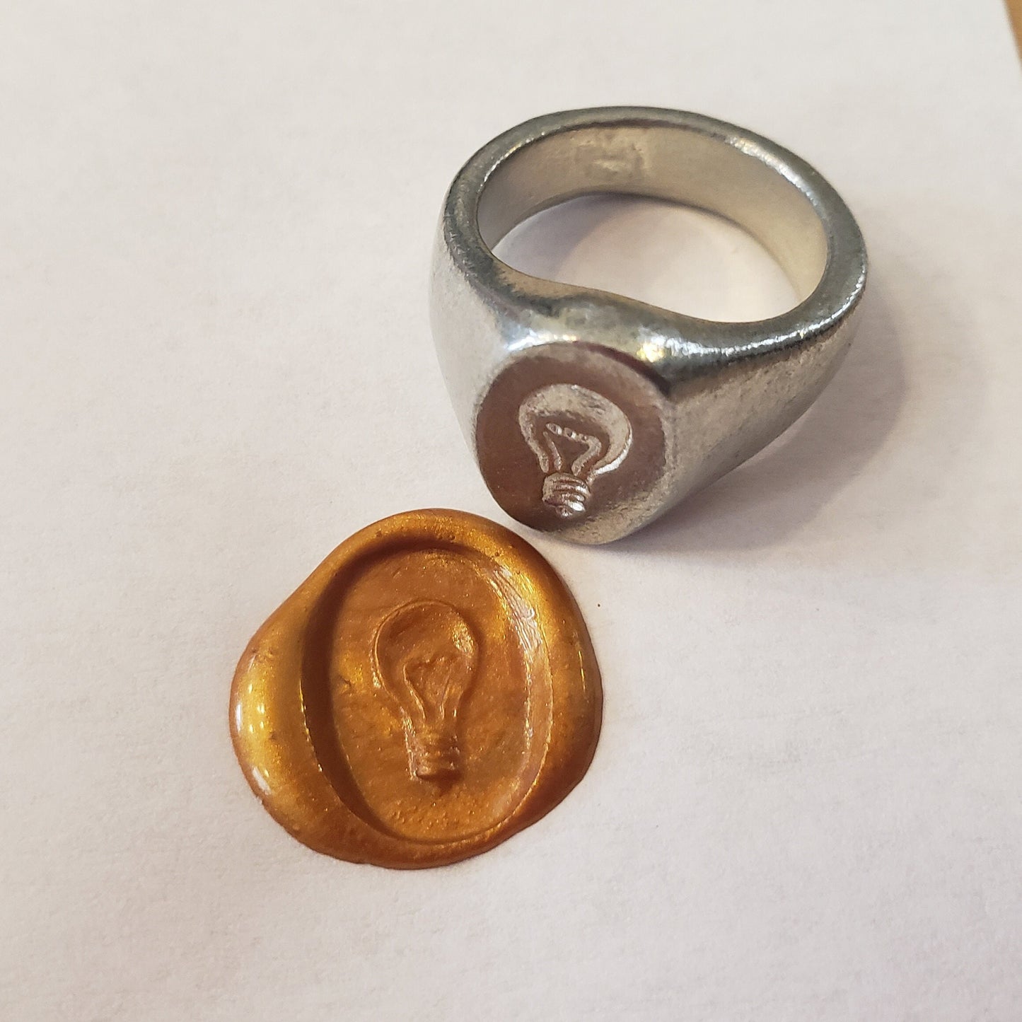 Incandescent lightbulb wax seal signet ring