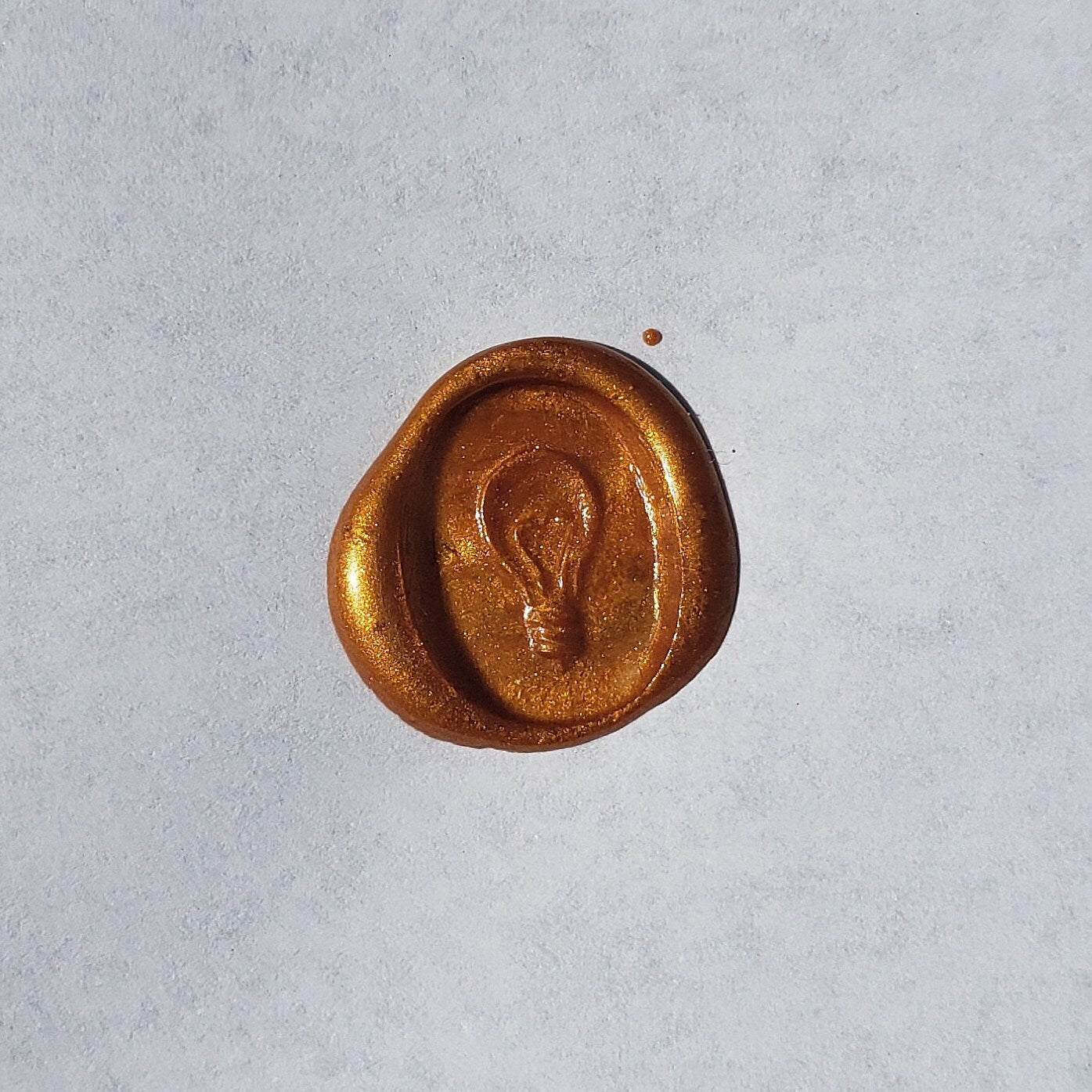 Incandescent lightbulb wax seal signet ring