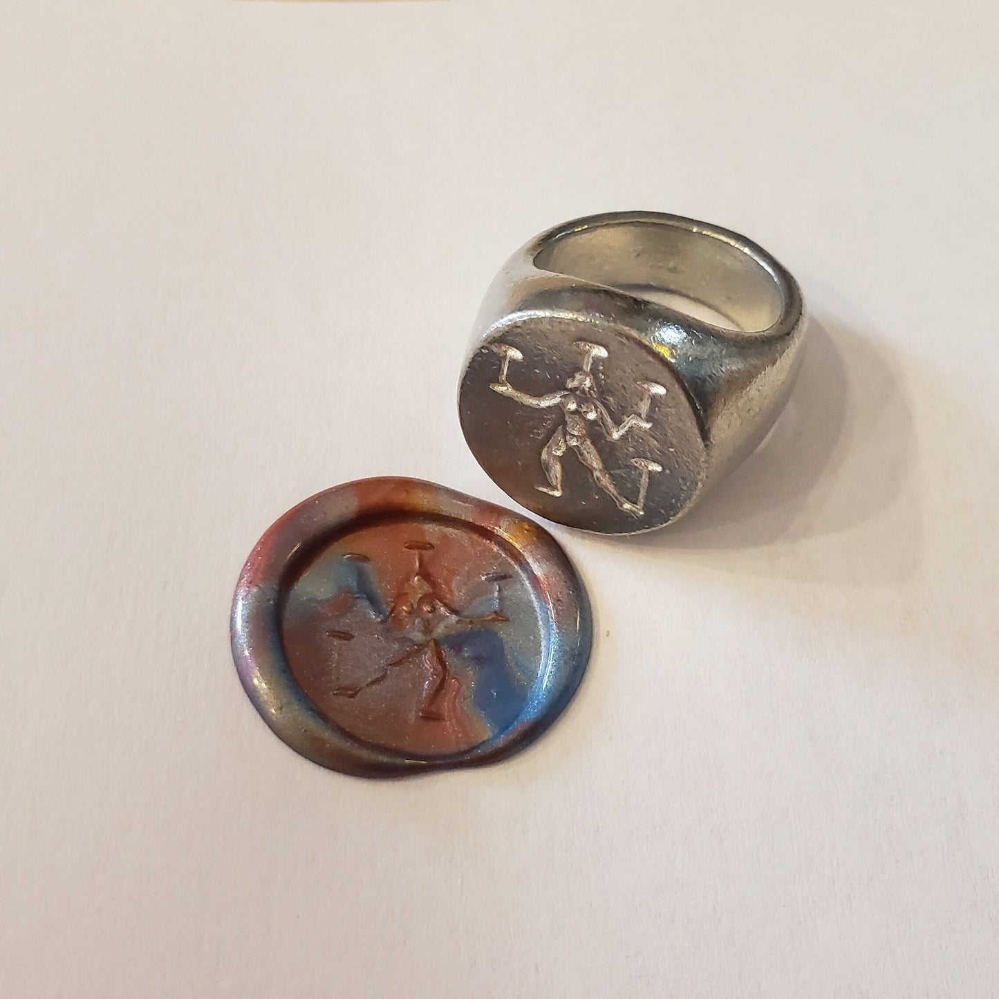 Plate spinning wax seal signet ring